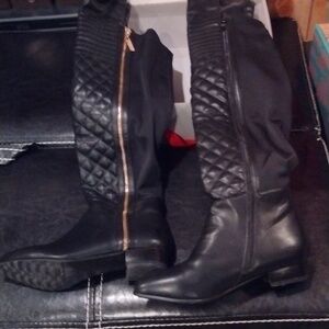 Black leather quilted over the knee boots